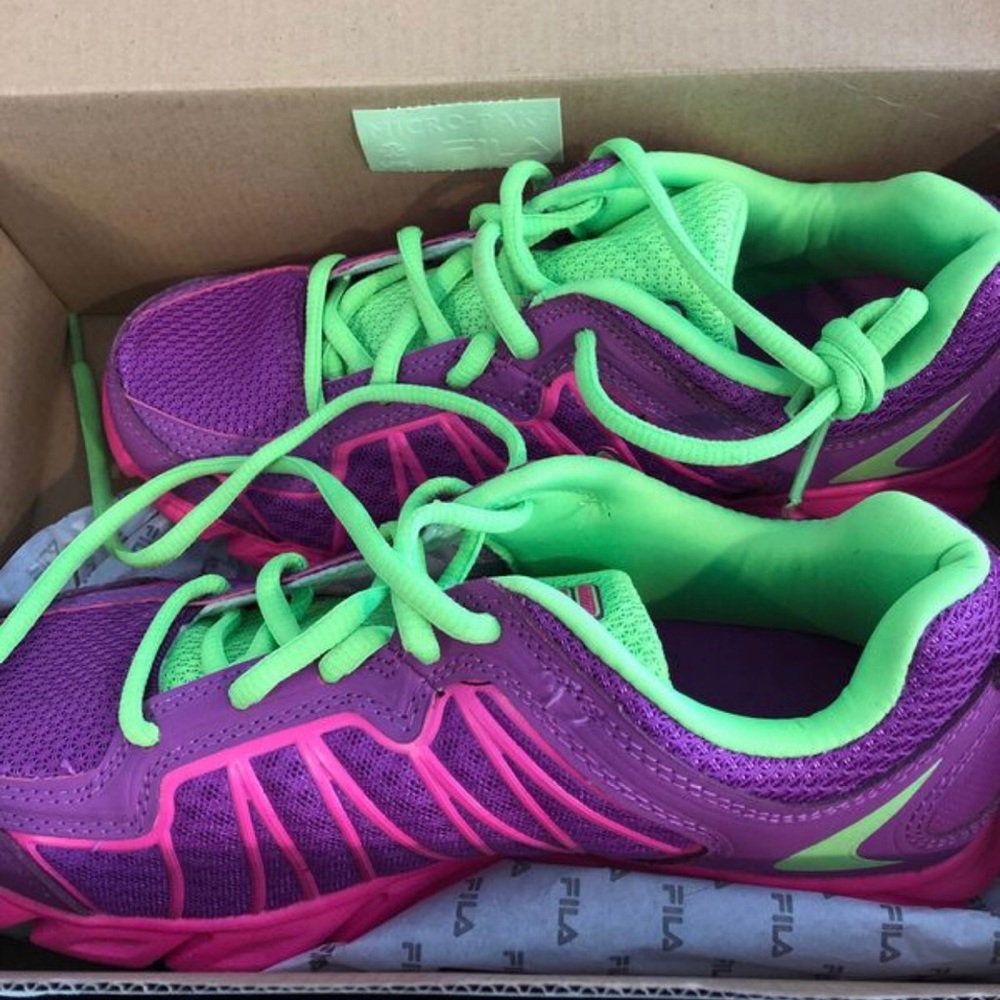 Purple and green Fila gym shoes